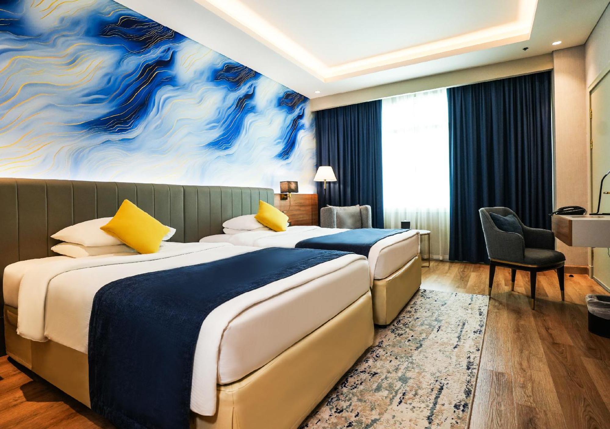 ホテル Moevenpick Grand Al Bustan ドバイ エクステリア 写真